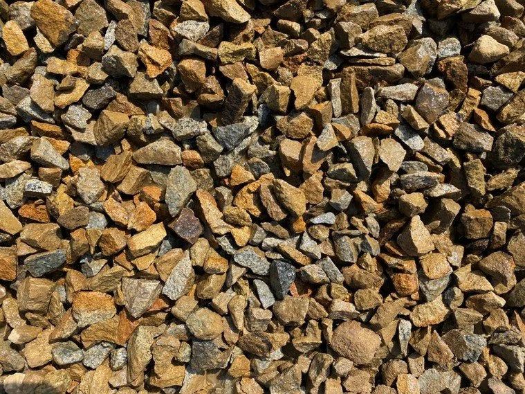 Golden granite chippings, by unnamed vendor, with a textured, 10mm surface for garden use.
