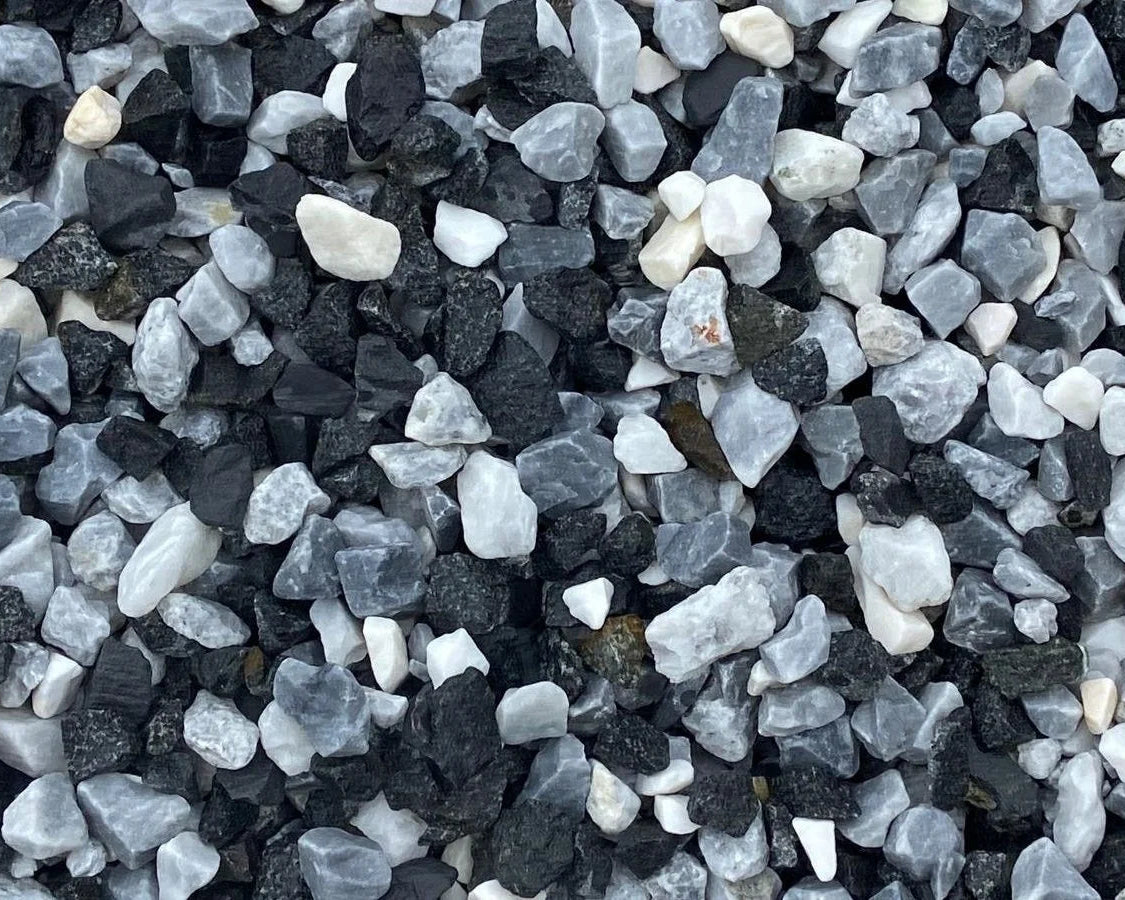 Black ice pond chippings by 20mm, showing a mix of black, grey and white stones.