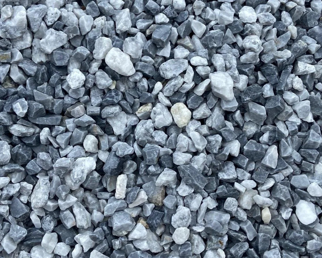 20mm alpine blue pond chippings with mixed stone texture and various neutral tones.