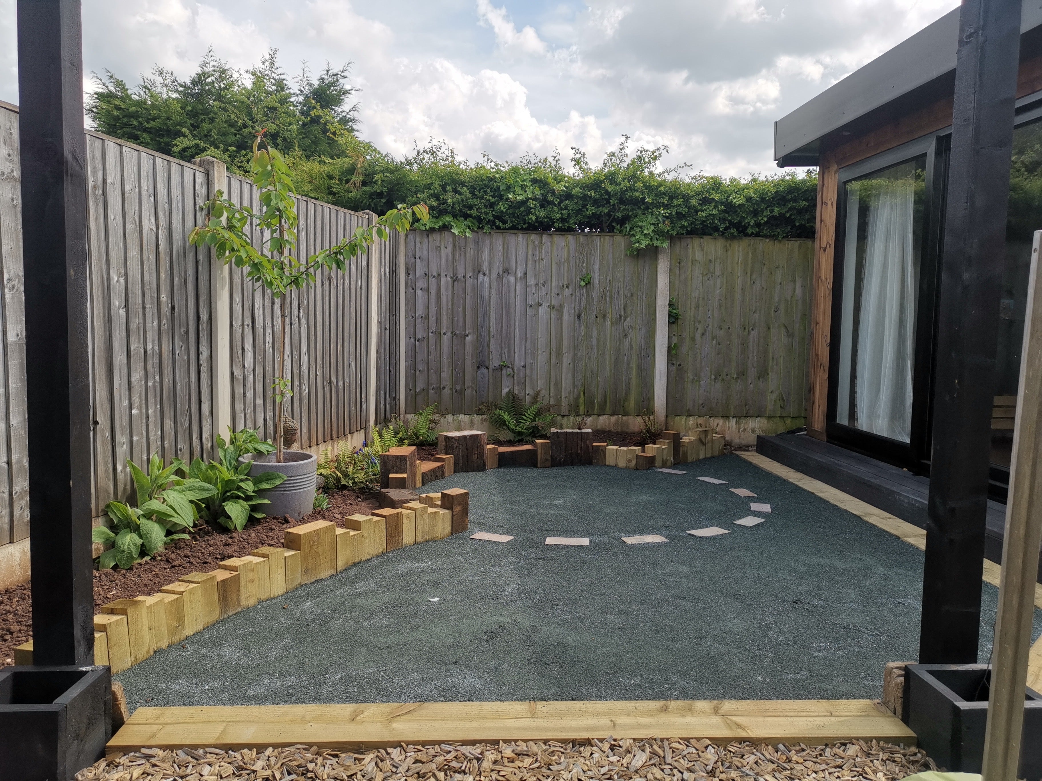Green granite self bind by Bulk Bag sitting in a garden space.