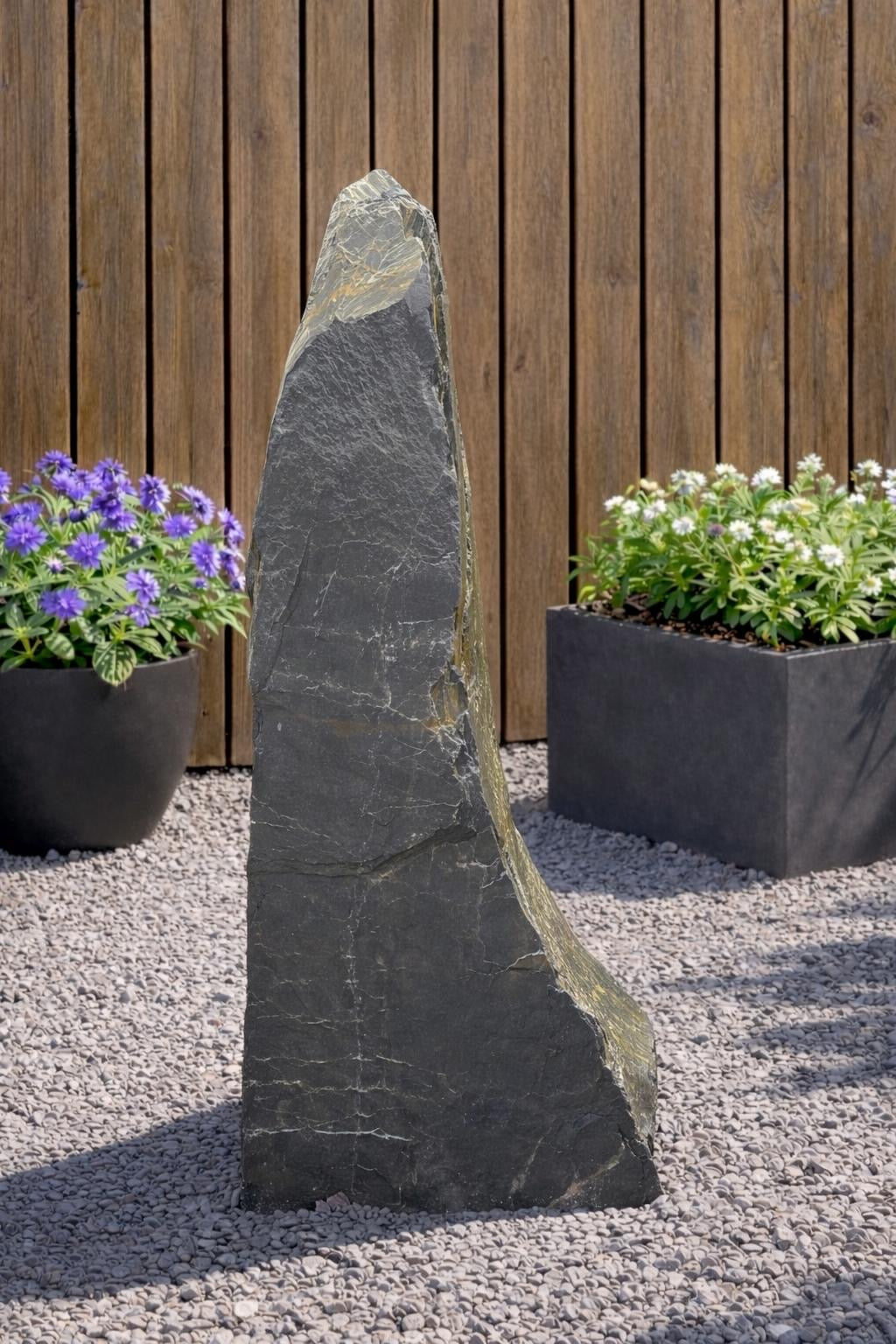 Slate monolith water feature from Water Feature with visible natural stone texture.