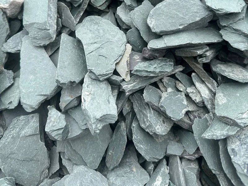 Green slate pond chippings, 40mm, with a rough, layered texture.