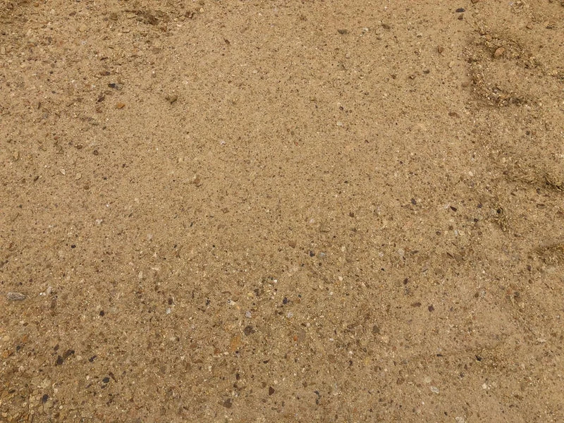 Fine horticultural sand by the bulk bag, showing a grainy, tan-colored texture.