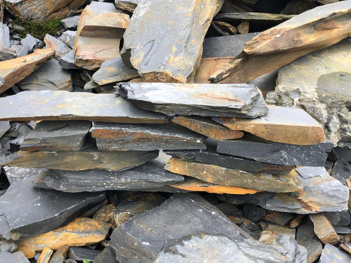 Rustic grey slate stone walling for landscapes, with multi-toned, layered texture and rough edges.

