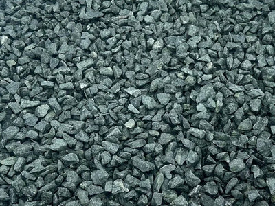 10mm green granite chippings for pond edging with a rough and varied texture.
