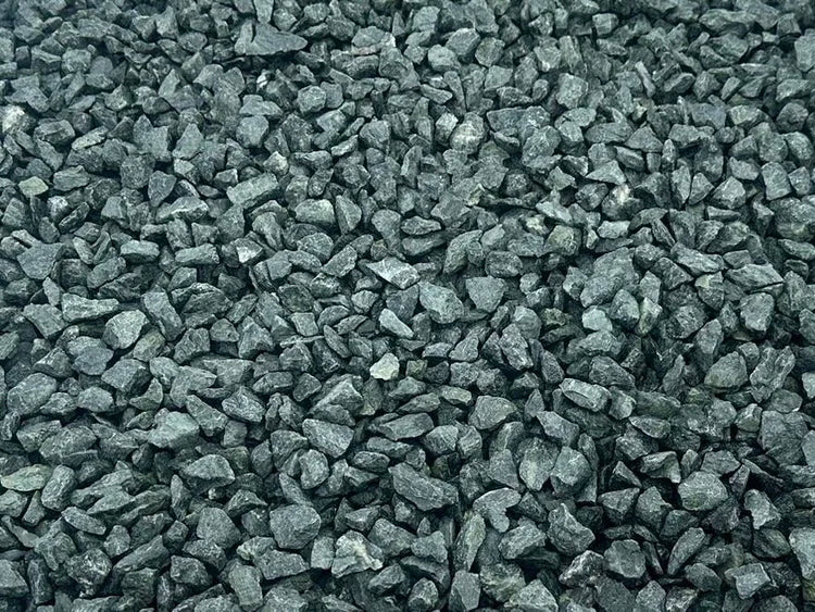 10mm green granite chippings for pond edging with a rough and varied texture.
