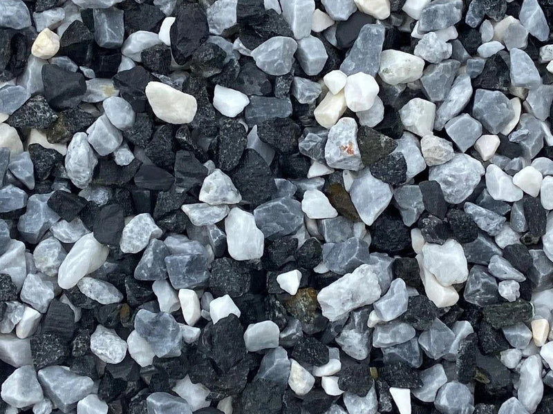 Black ice pond chippings by 20mm, showing a mix of black, grey and white stones.