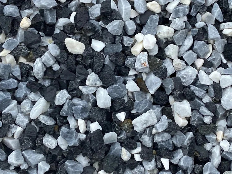 Black ice chippings by [Vendor Name] with mixed black, white, and grey stones.