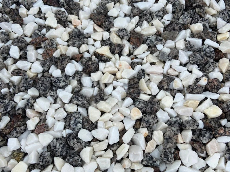 20mm Arctic Silver chippings in bulk bag with a blend of white and grey stones.