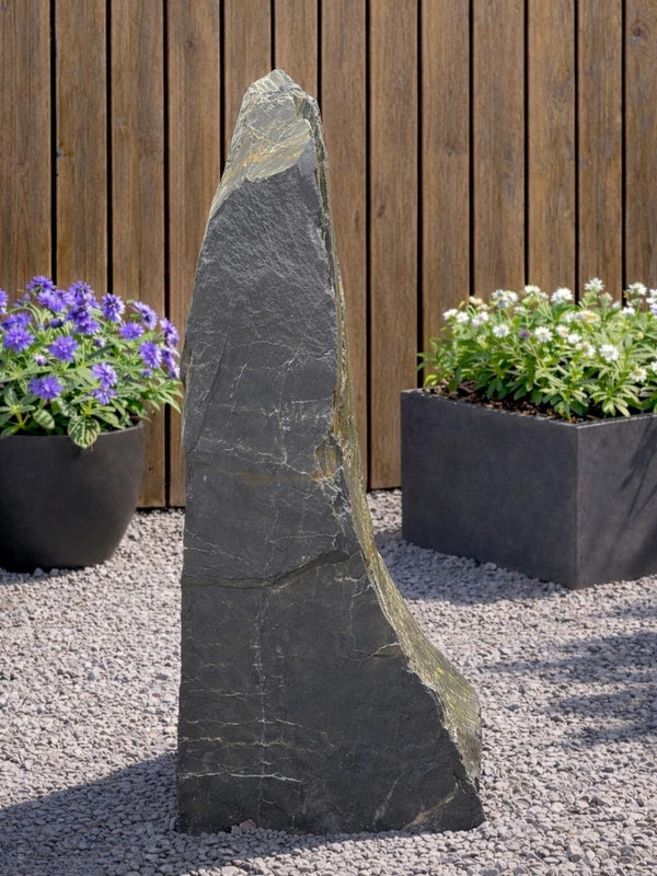 Slate monolith water feature from Water Feature with visible natural stone texture.
