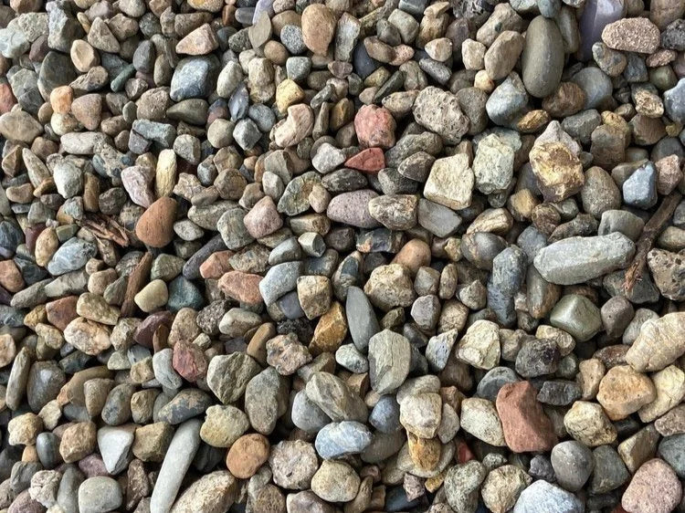 Assorted beach cobbles 40-90mm, displaying varied colors and textures.
