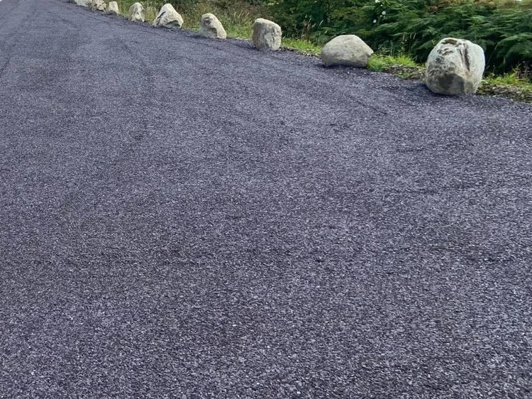 Plum slate self-binding gravel for driveways with visible stone features.